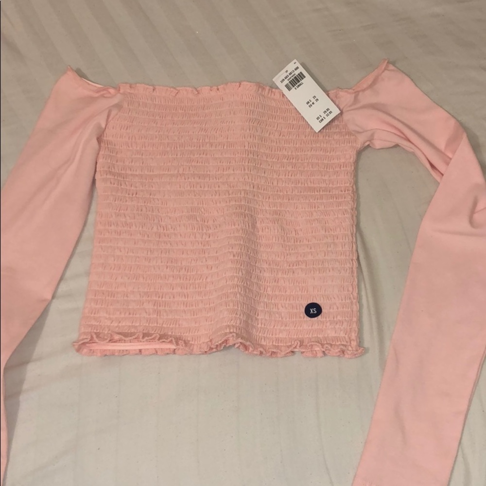 A pink Hollister long sleeve off the shoulder top